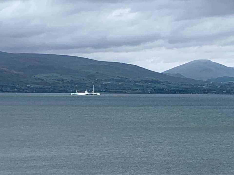 Carlingford Lough Ferry and the Mourne Mountains beyond